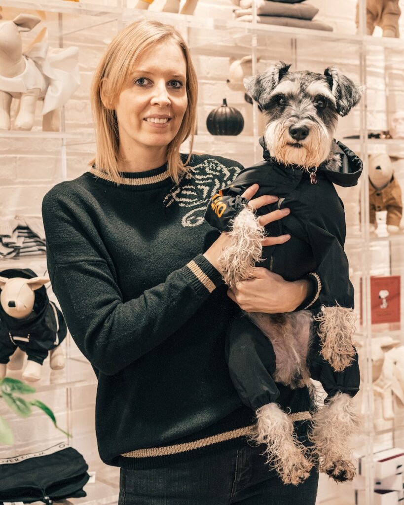 woman holding dog